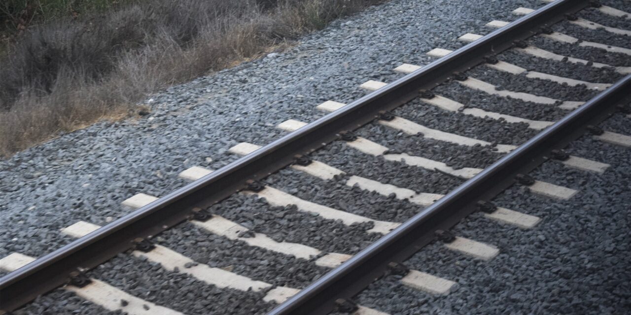 Train collides with vehicle on the railroad tracks