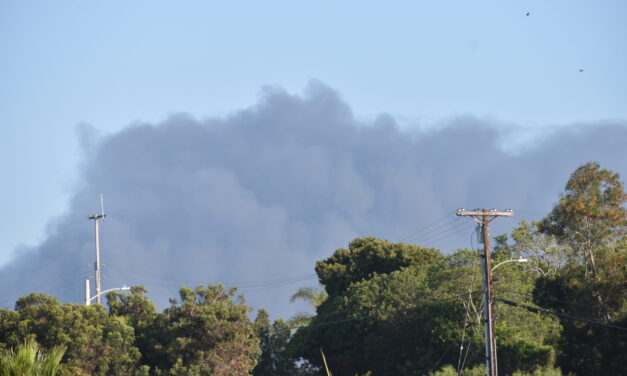 Fire breaks out from large piles of metal at recycling business