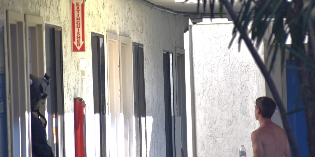 Man brandishing samurai-style sword barricades inside Carlsbad motel