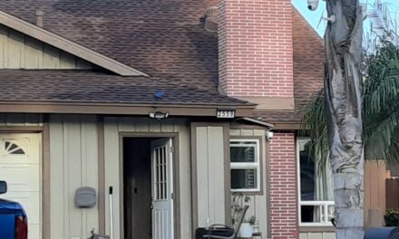 Residential fire in garage displaces seven residents, pets