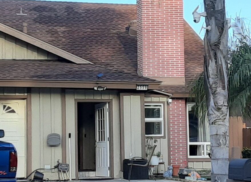 Residential fire in garage displaces seven residents, pets