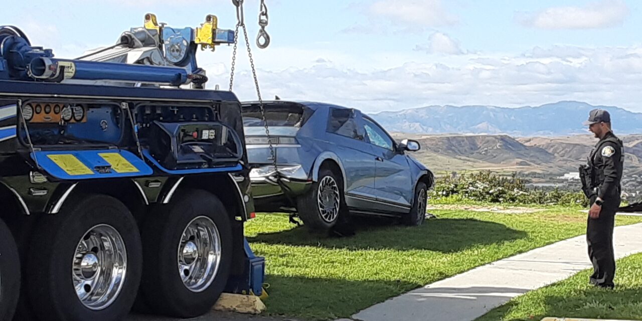 Three people rescued after vehicle plunges down hillside
